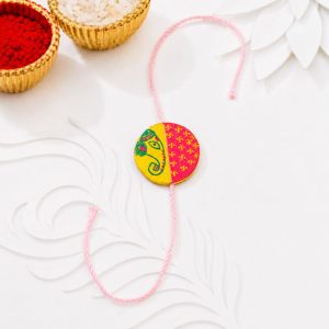 Handmade Manjusha Art Rakhi with Ganesha & Swastik Motif | Traditional Hand-Painted Raksha Bandhan Rakhi